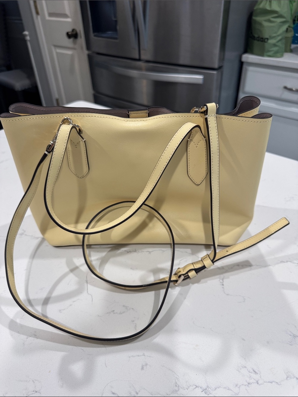 kate spade Cream Leather Tote with Top Handles. Color is butter. - Picture 2 of 5